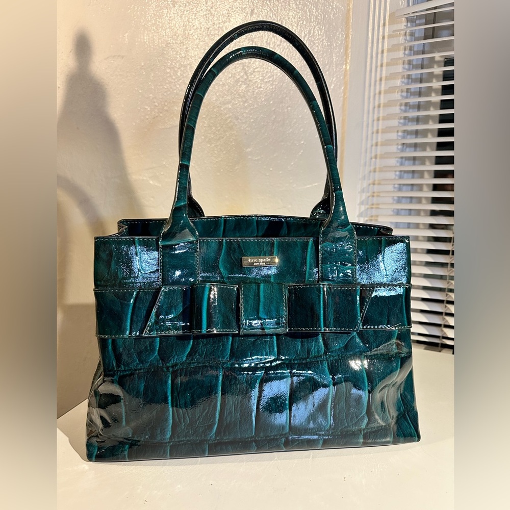 Glossy teal perfection! Kate Spade patent leather teal moc croc handbag.